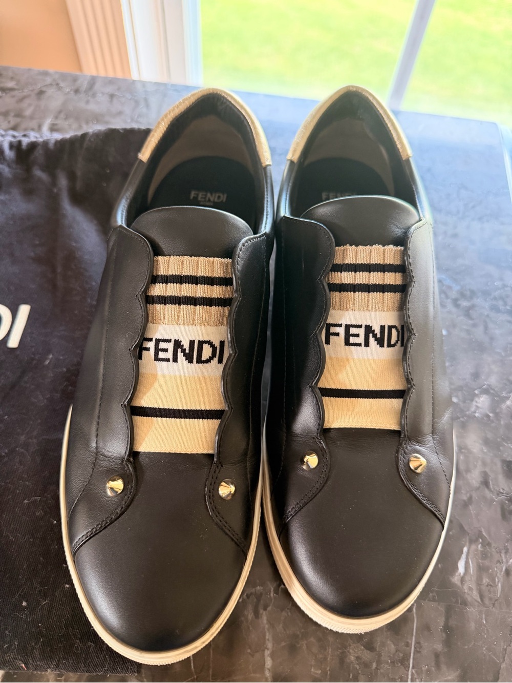 Authentic Fendi Black Leather Slip-On Sneakers with Beige Knit Logo